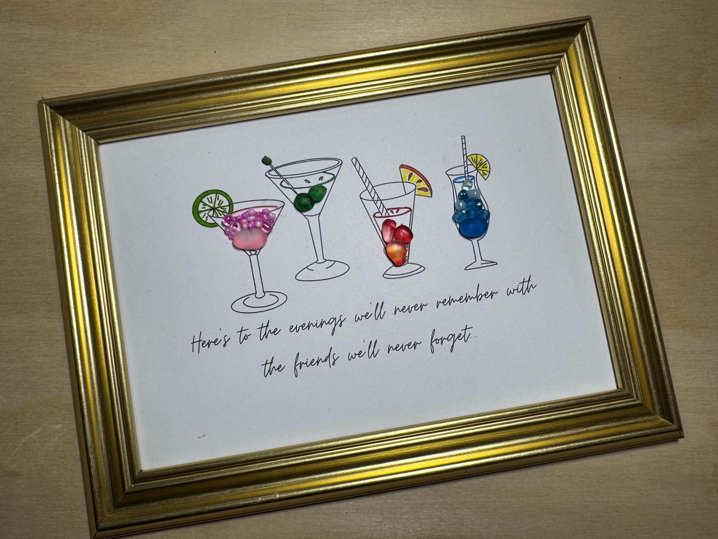 Arte enmarcado de vidrio marino de cóctel